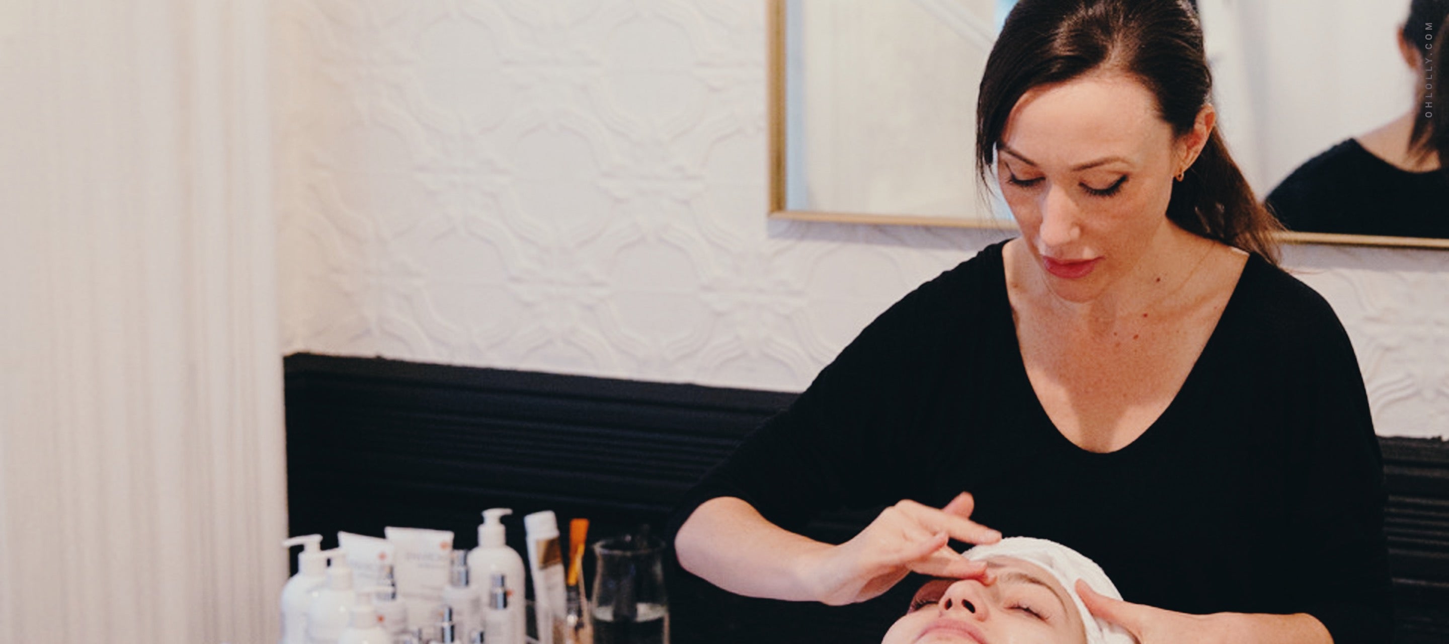 Celebrity facialist Kristyn Smith performing a professional facial treatment for a pro skincare interview feature.