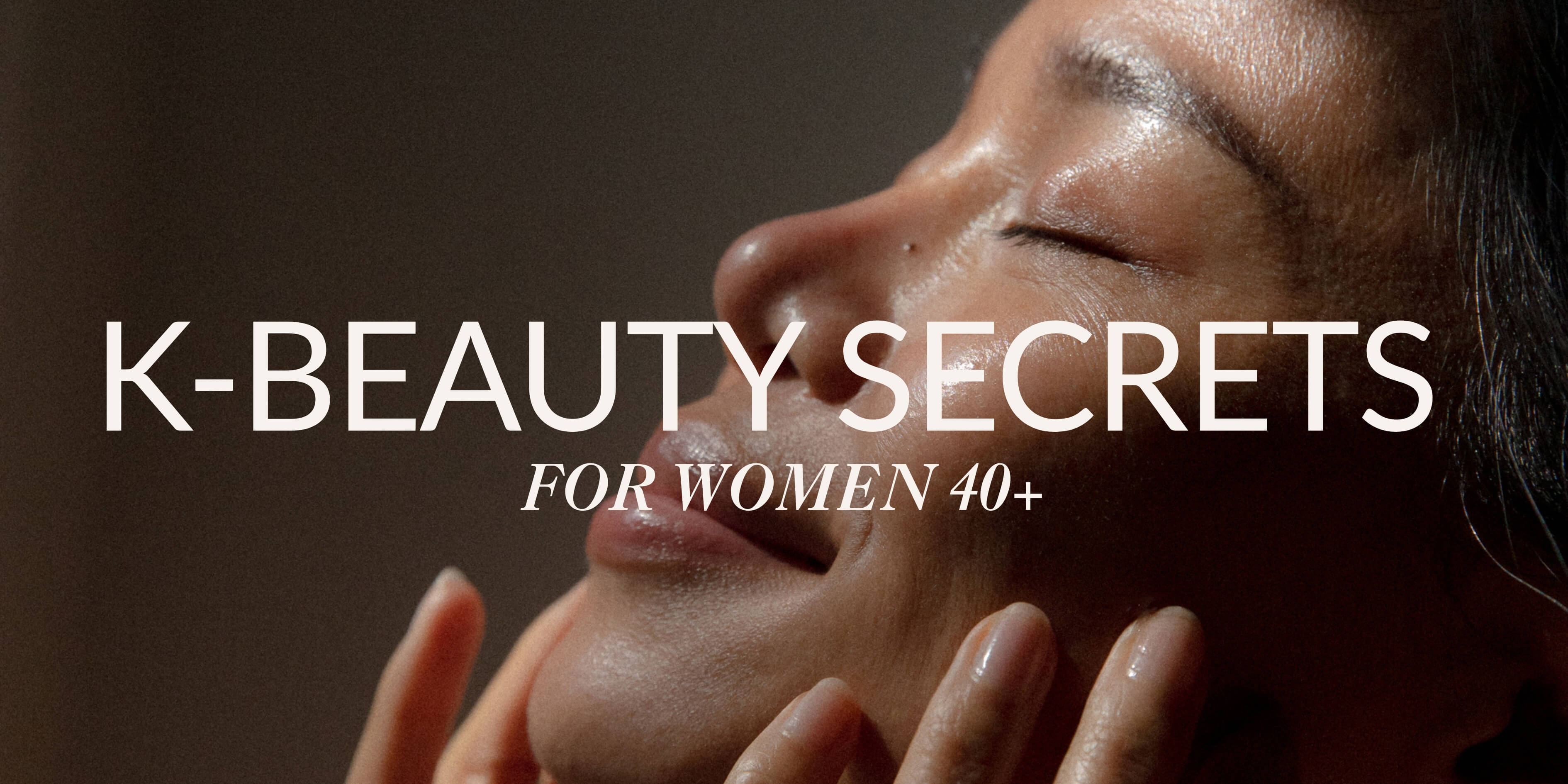 A radiant woman 40+ massages her face, with text reading "K-BEAUTY SECRETS FOR WOMEN 40+".