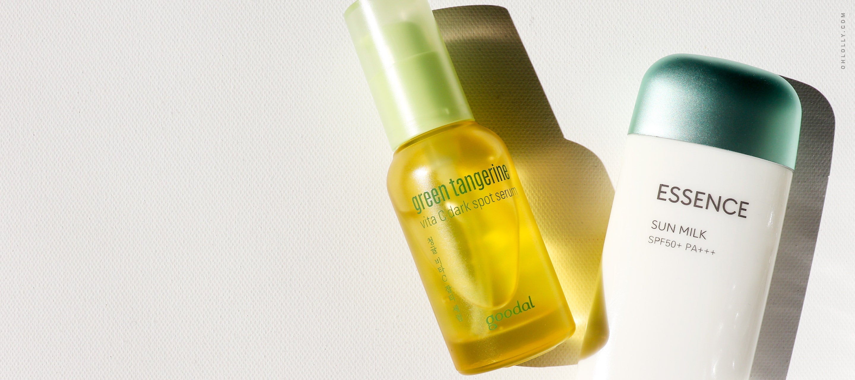 Goodal Green Tangerine Vitamin C Serum and Essence Sun Milk bottle for a bright, protected skincare routine.