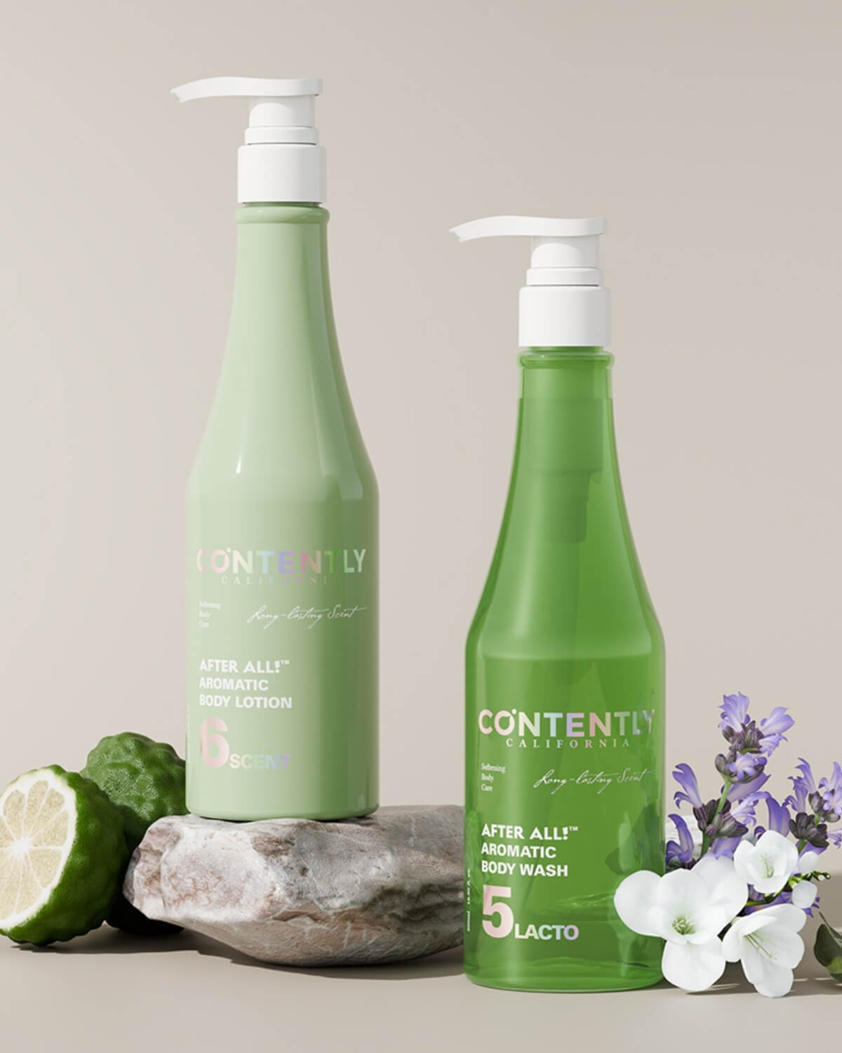 A light green bottle of "After All! Aromatic Body Lotion" (left) and a green bottle of "After All! Aromatic Body Wash" (right) are displayed on a light background. The body lotion is on a rock with a halved bergamot fruit, and the body wash is flanked by sprigs of lavender and small white flowers