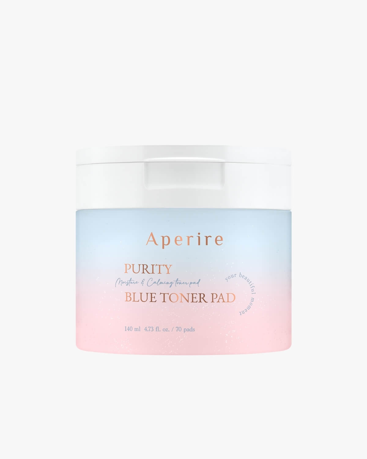 A centered product shot of the round container of Aperire Purity Blue Toner Pad. The jar has a white lid and a body with a frosted, light blue-to-pink ombre design, set against a neutral white background.
