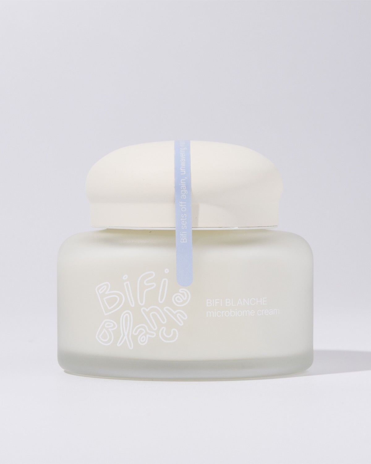 Front view of the frosted glass jar of Bifi Blanche Microbiome Moisture Cream with white text.