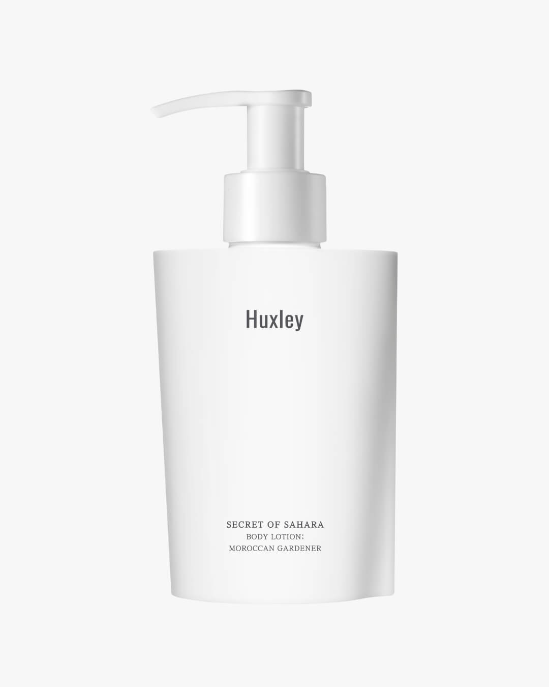 Huxley Secret of Sahara Body Lotion Moroccan Gardener white bottle with a pump dispenser.