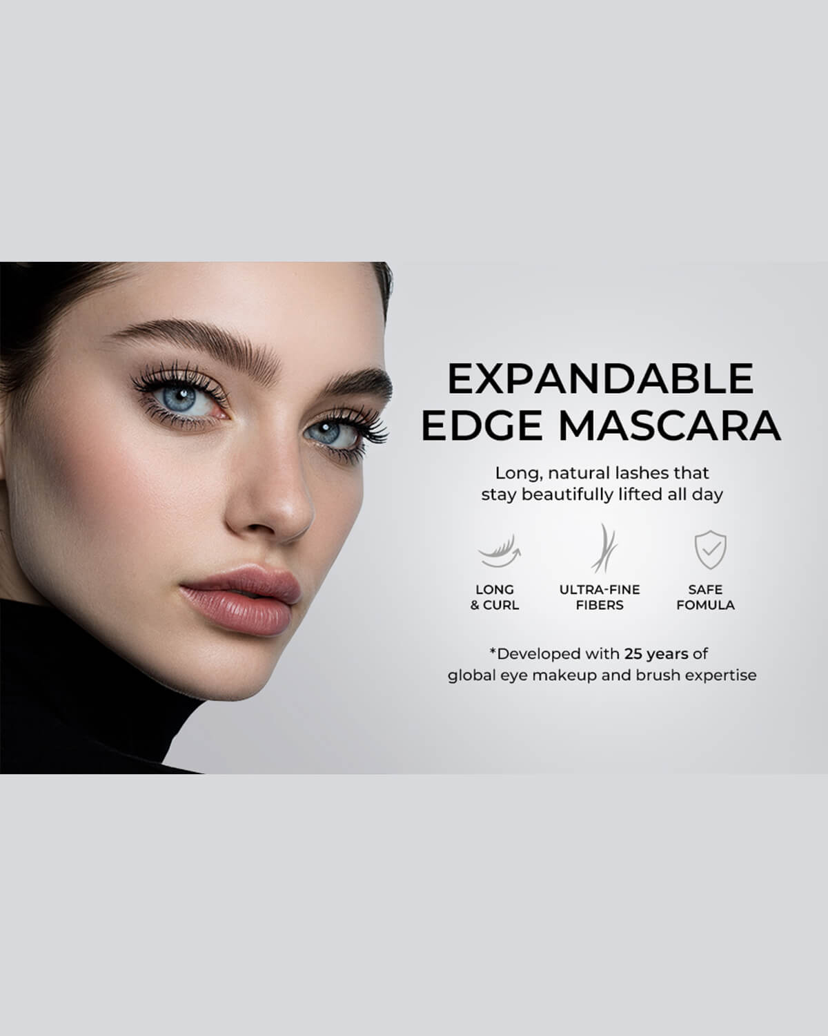 Model displaying long, natural, lifted lashes achieved with Quietone Expandable Edge Mascara safe fiber formula.