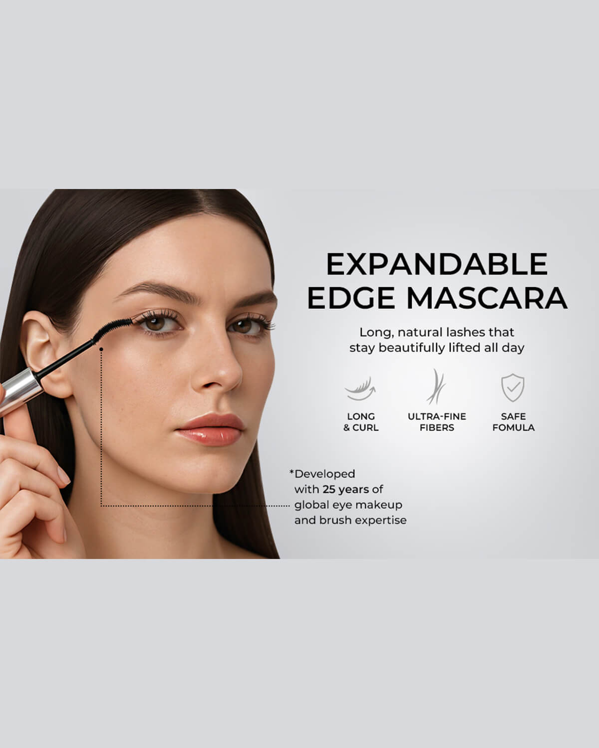 Model applying Expandable Edge Mascara using the precise curved brush for long, beautifully lifted eyelashes.