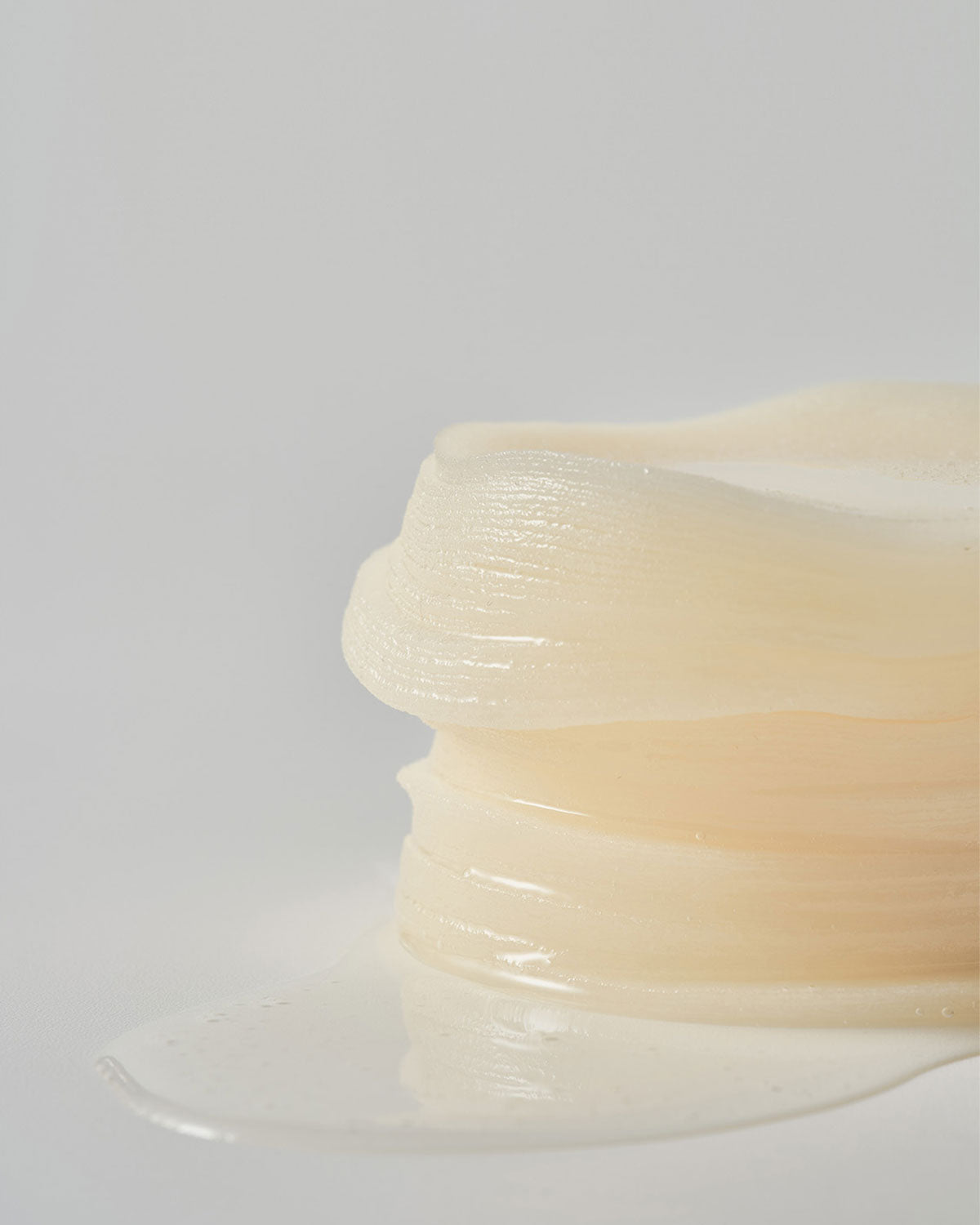 Stack of moist Equlib Eau Briller Pads removed from the container. Toner pads soaked in hydrating essence.