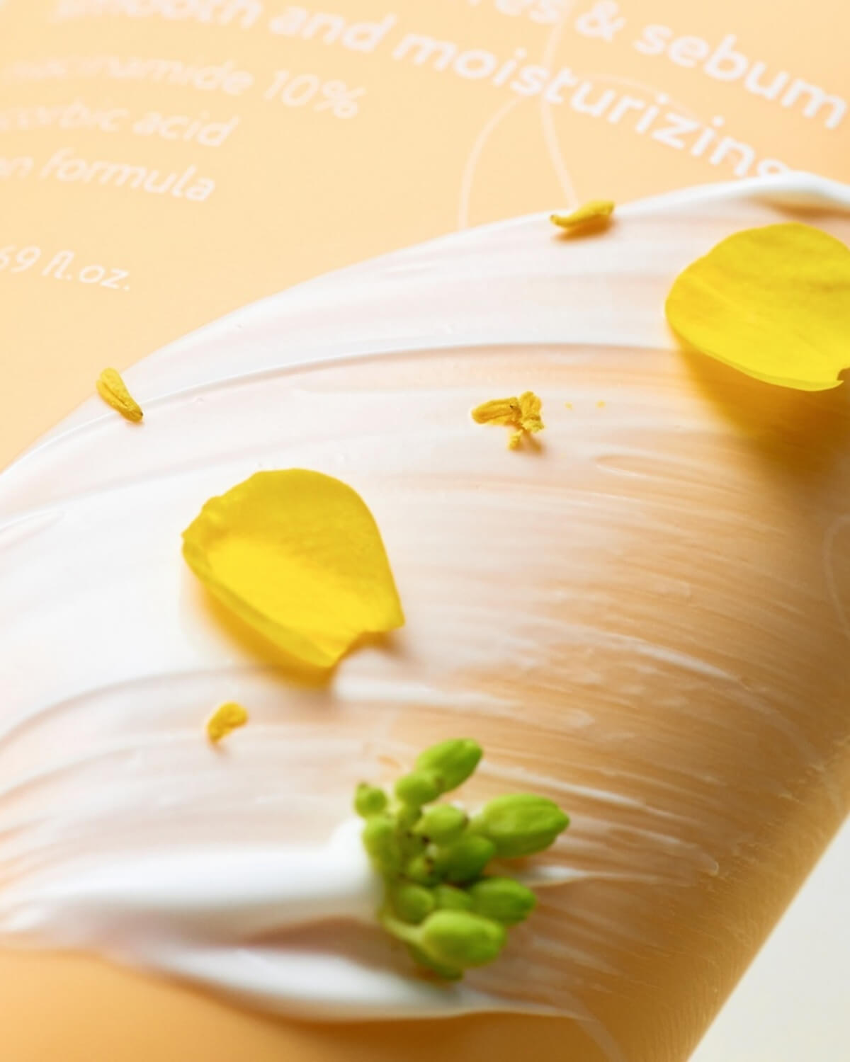 Close-up texture of Face Republic Niacin 10 Cream showing smooth white moisturizer consistency.