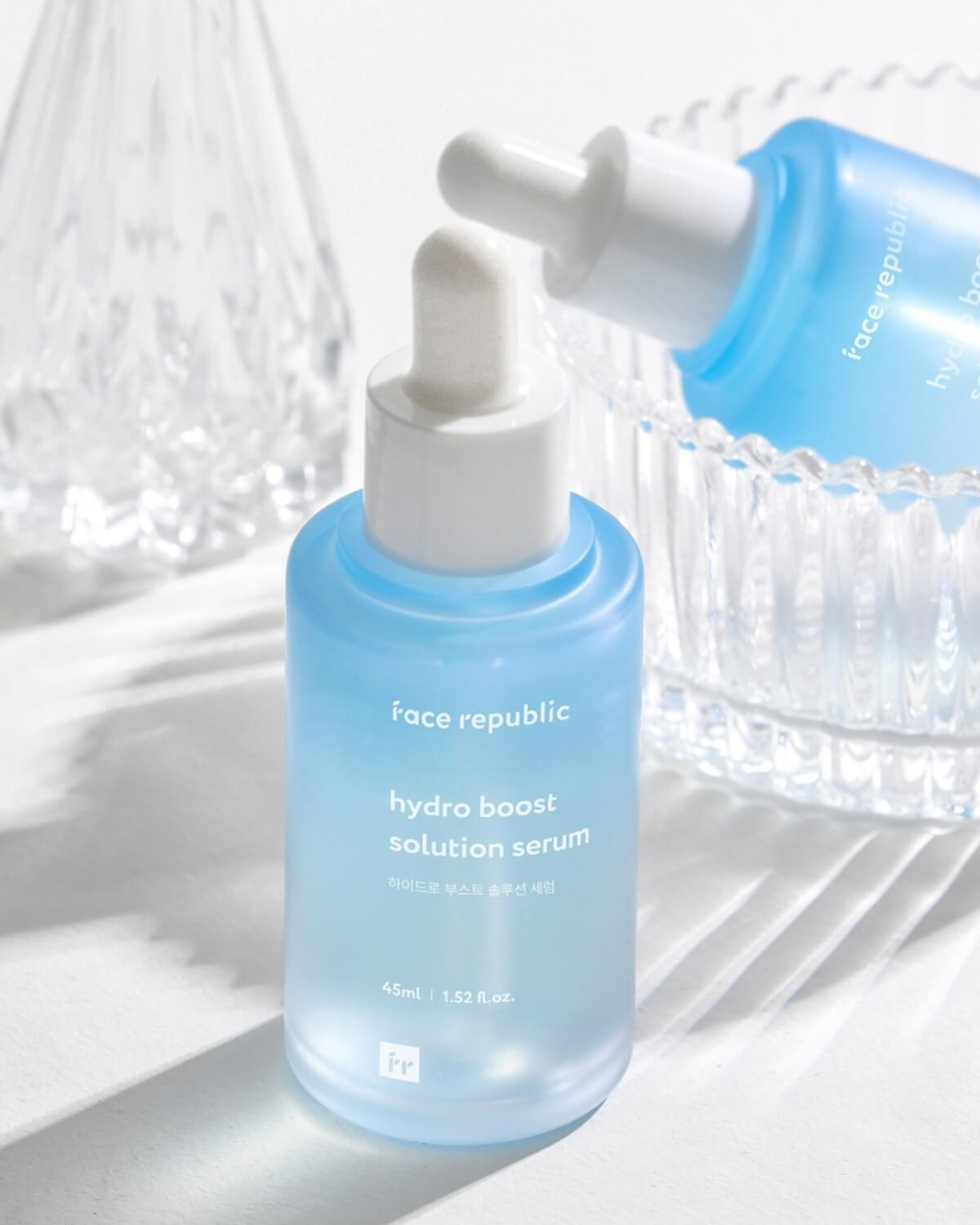 Aesthetic display of Face Republic Hydro Boost Solution Serum bottles.