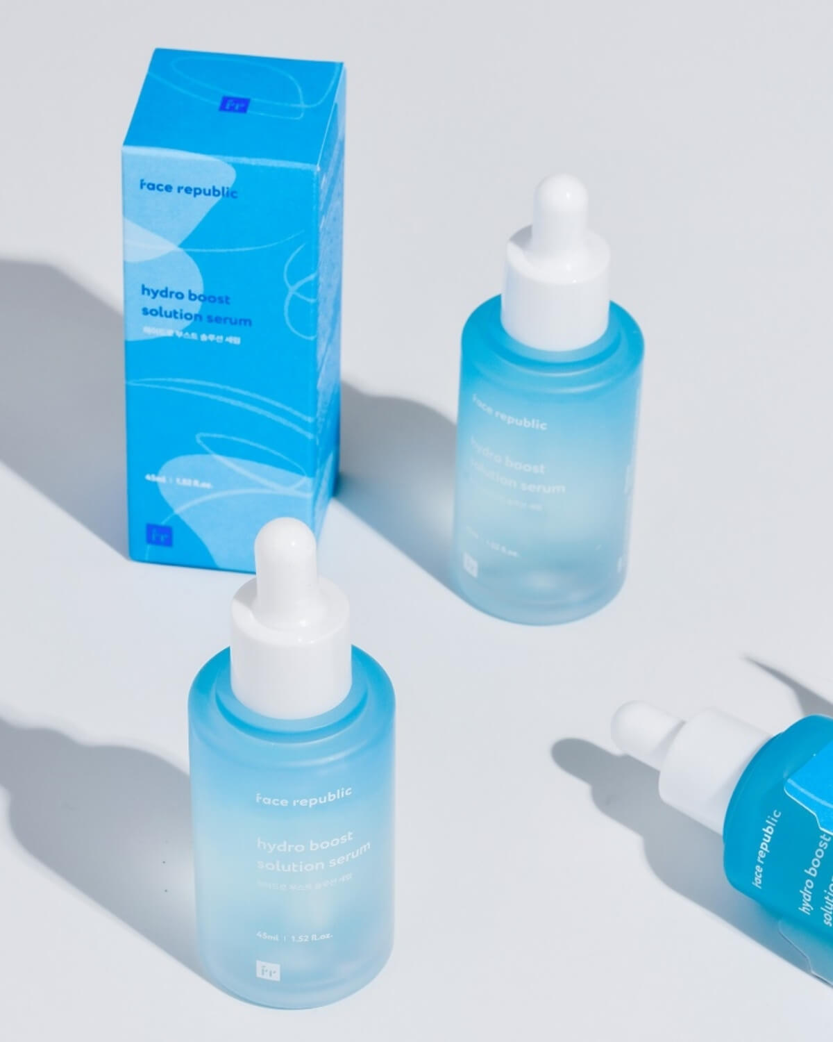 Face Republic Hydro Boost Solution Serum packaging and product bottles.