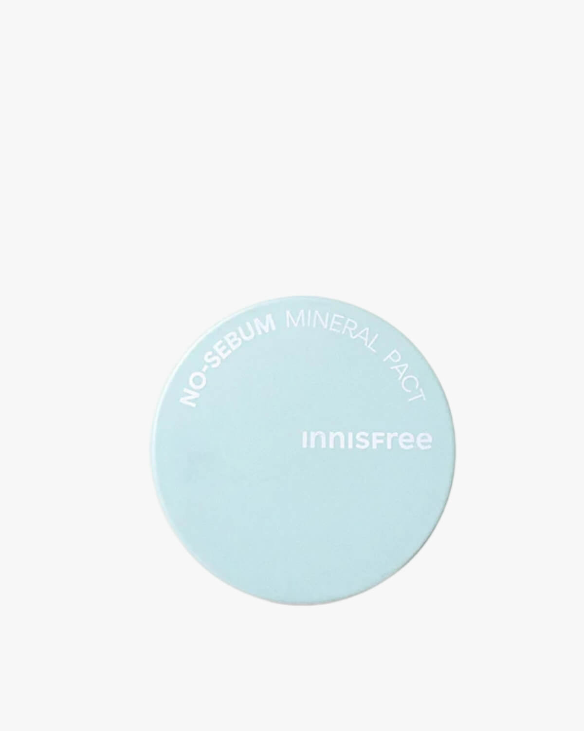 A round mint green powder compact shown next to its square retail box.