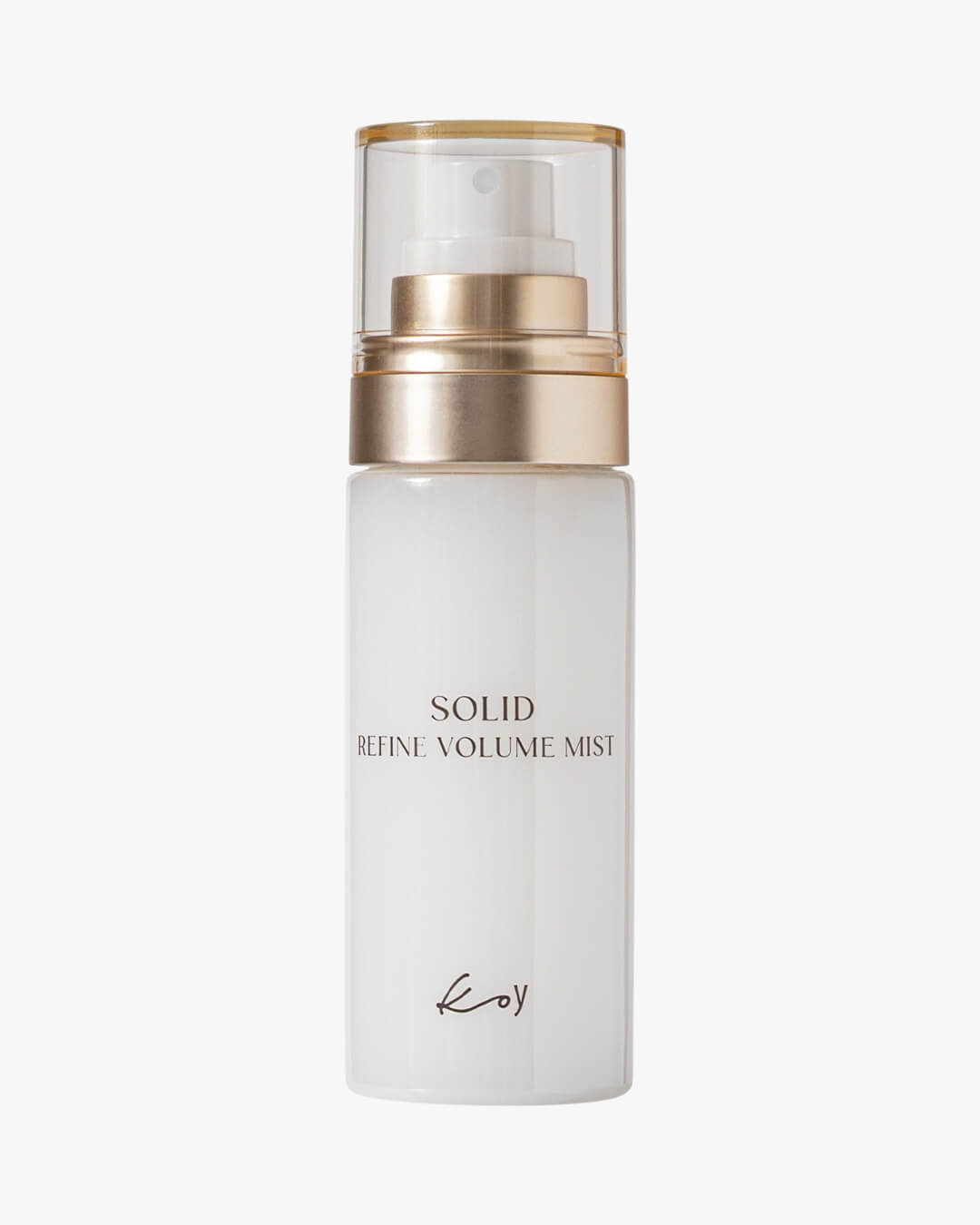 Koy Solid Refine Volume Mist in a sleek white spray bottle with a gold pump cap for facial hydration.