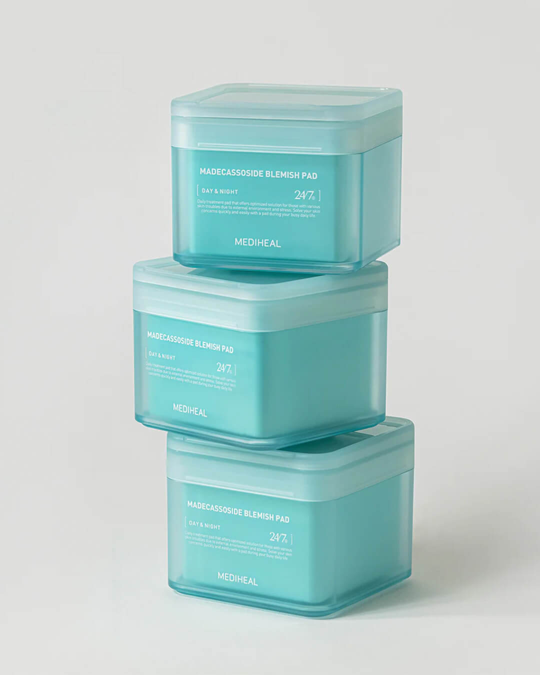 Mediheal Madecassoside Blemish Pad_Daily Blemish Treatment Mask Pad, stack of products on a white background