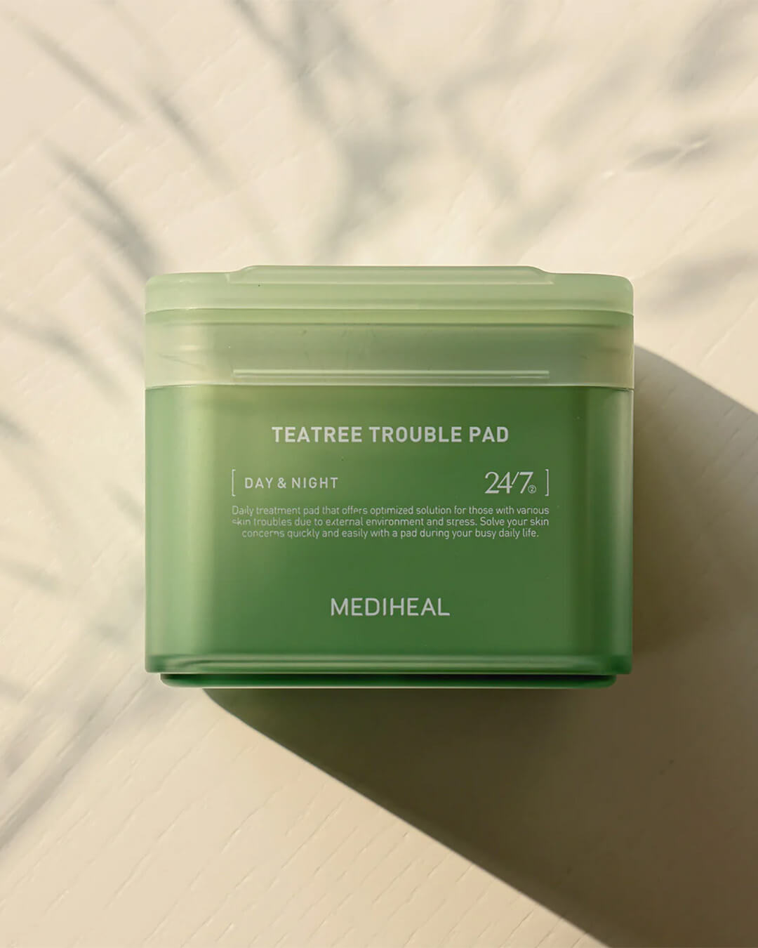 Mediheal Tea Tree Trouble Pad_Daily Toner + Treatment Mask Pad, product on a cream background