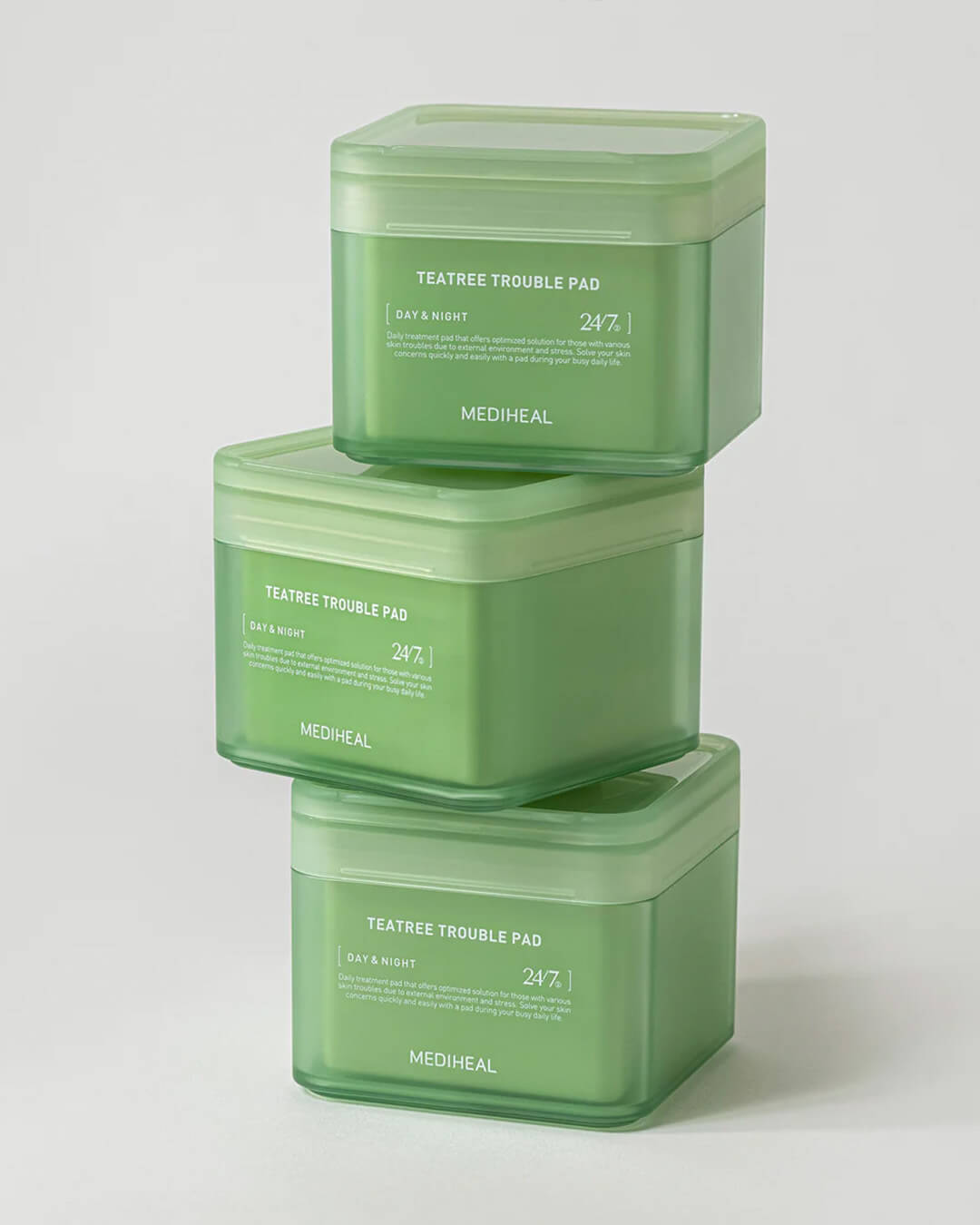 Mediheal Tea Tree Trouble Pad_Daily Toner + Treatment Mask Pad, stack of product on a white background