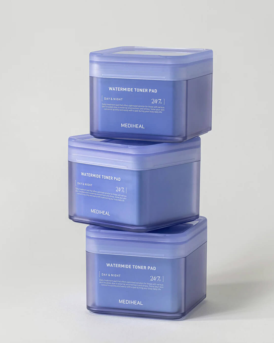 Mediheal Watermide Toner Pad_Hydrating & De-puffing Treatment Mask Pad, stack of products on a white background