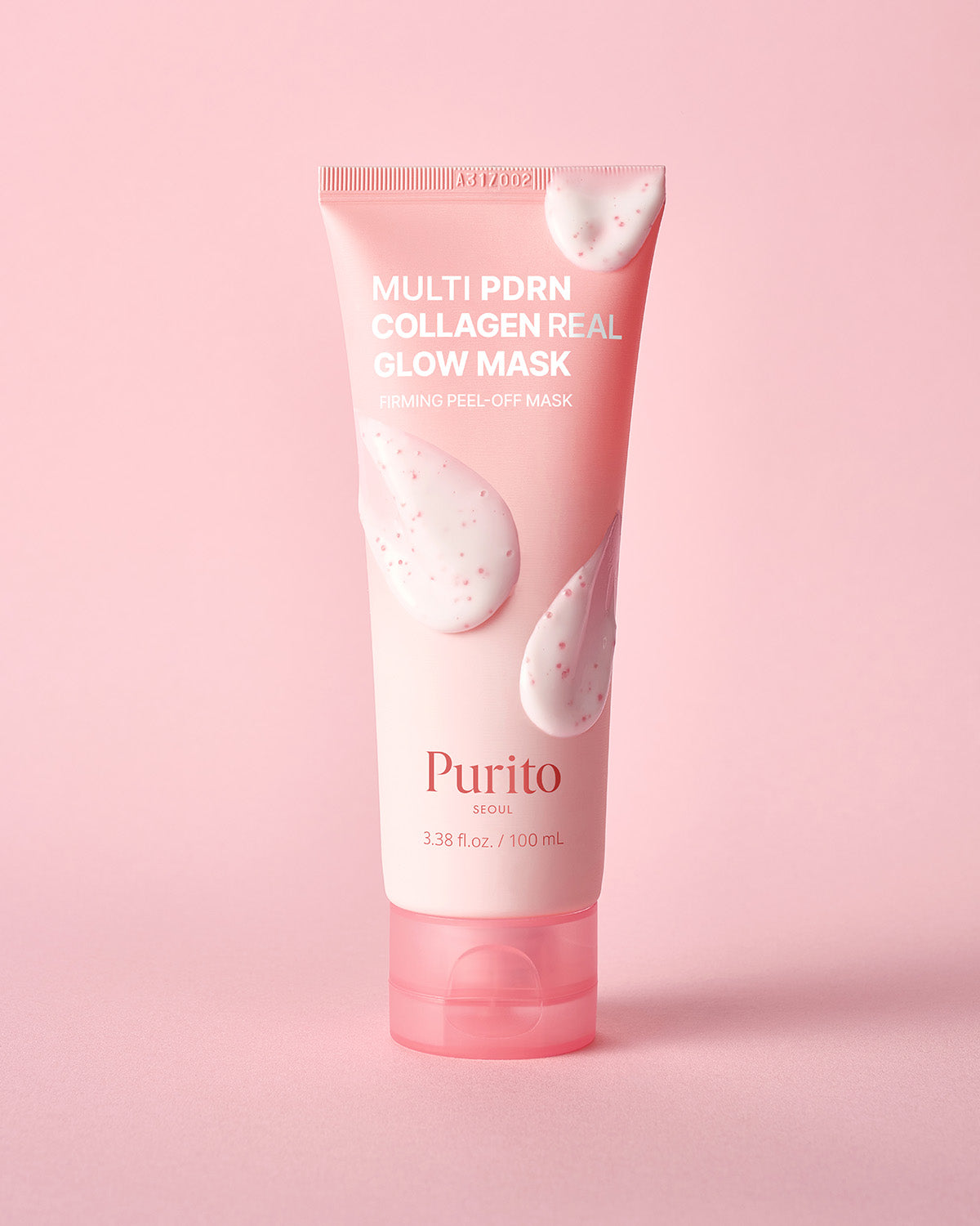 Purito Multi PDRN Collagen Real Glow Mask pink tube with three smears of creamy mask product on it.