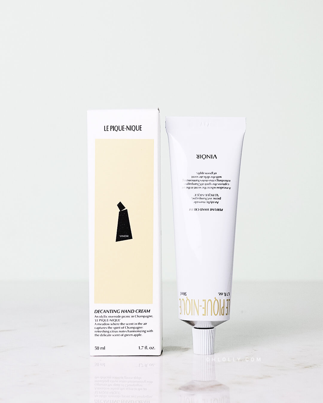 Ohlolly Korean Skincare Vinoir Decanting Hand Cream | Le Pique-Nique. Scented moisturizer for dry hands. Box and product on tabletop.