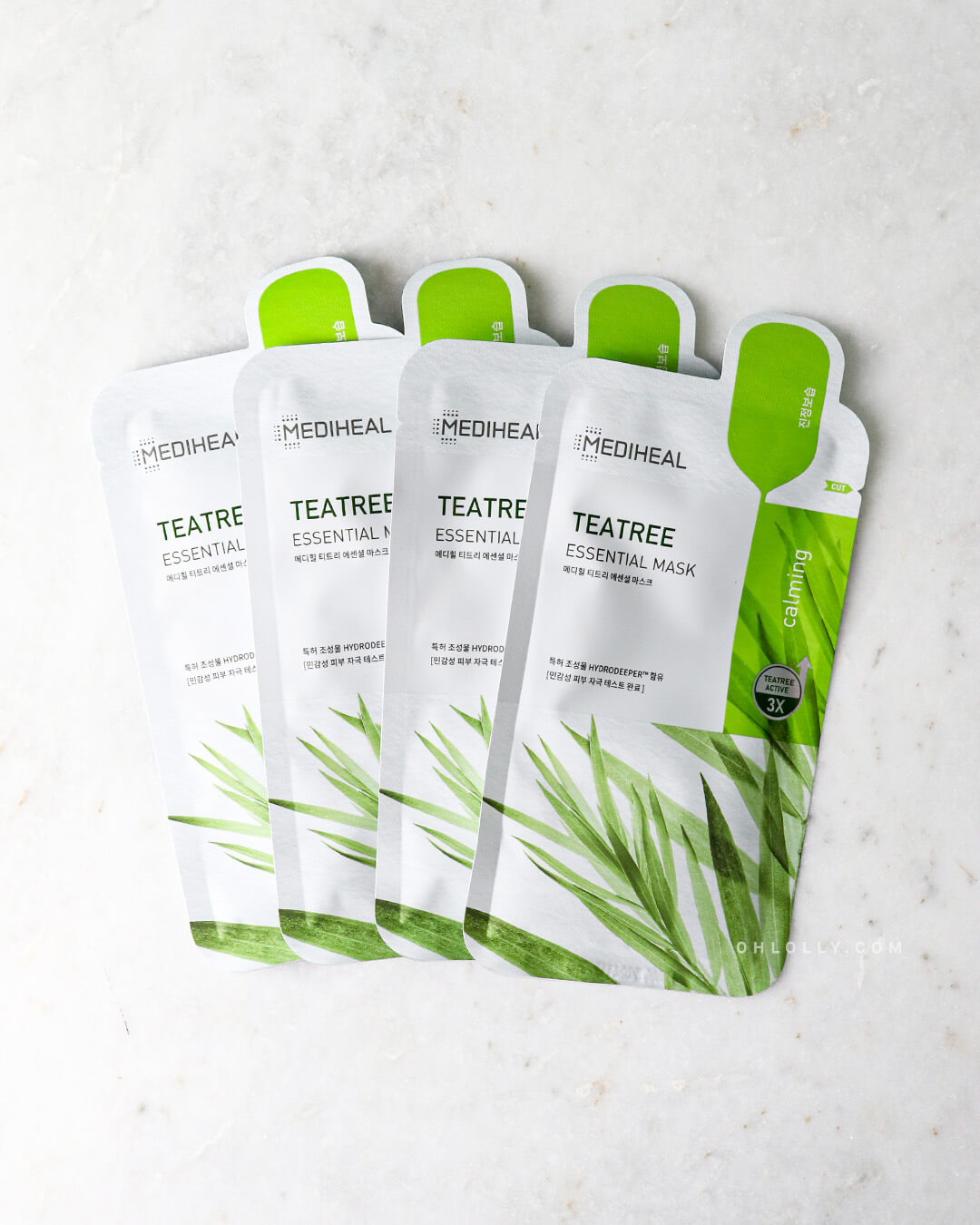 Mediheal Tea Tree Essential Mask_Intensive Calming & Clarifying Mask, 4 pieces of product on a white background