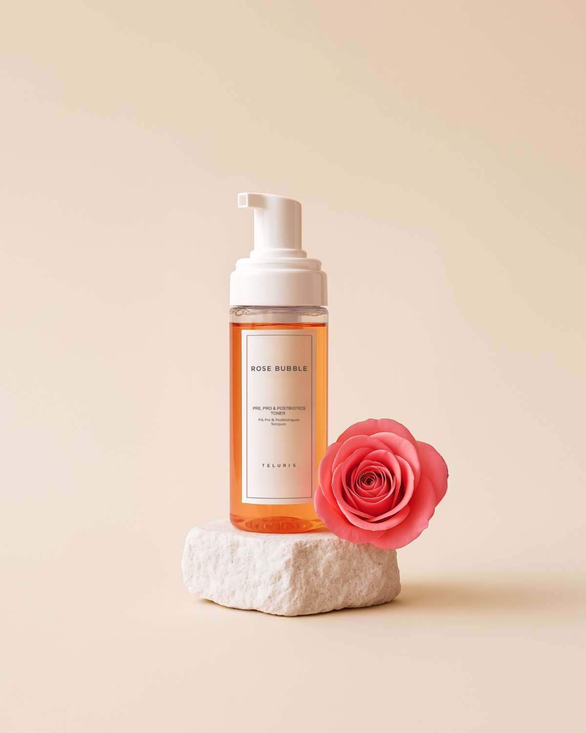 Teluris Rose Bubble Toner styled with a fresh pink rose for a floral, natural skincare aesthetic.