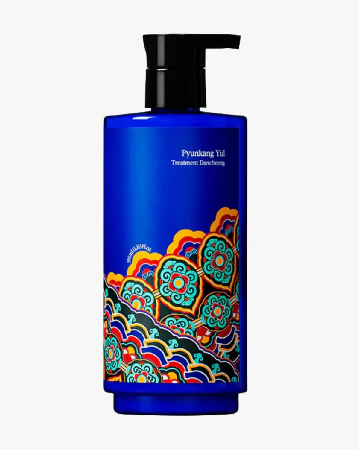 A cobalt blue pump bottle of Pyunkang Yul Treatment Dancheong featuring colorful, traditional Korean decorative patterns on the lower half, set against a white background.
