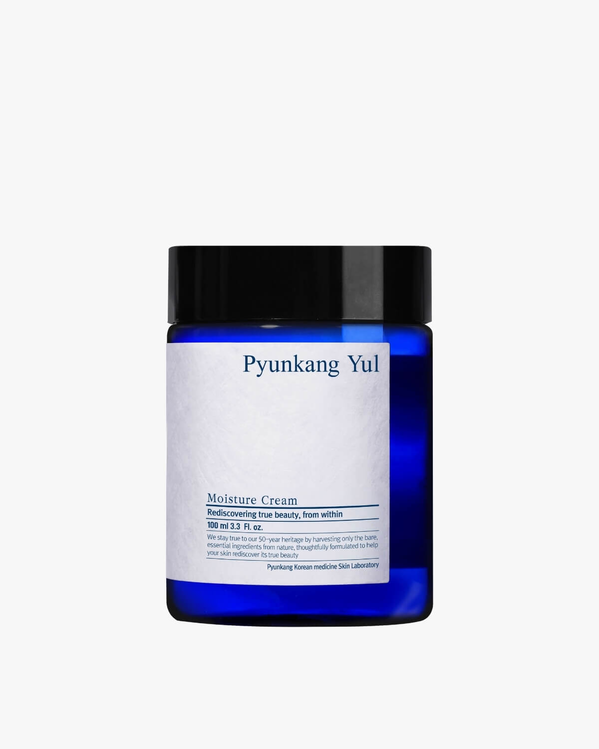 A squat, translucent dark blue jar with a black lid and a white label.