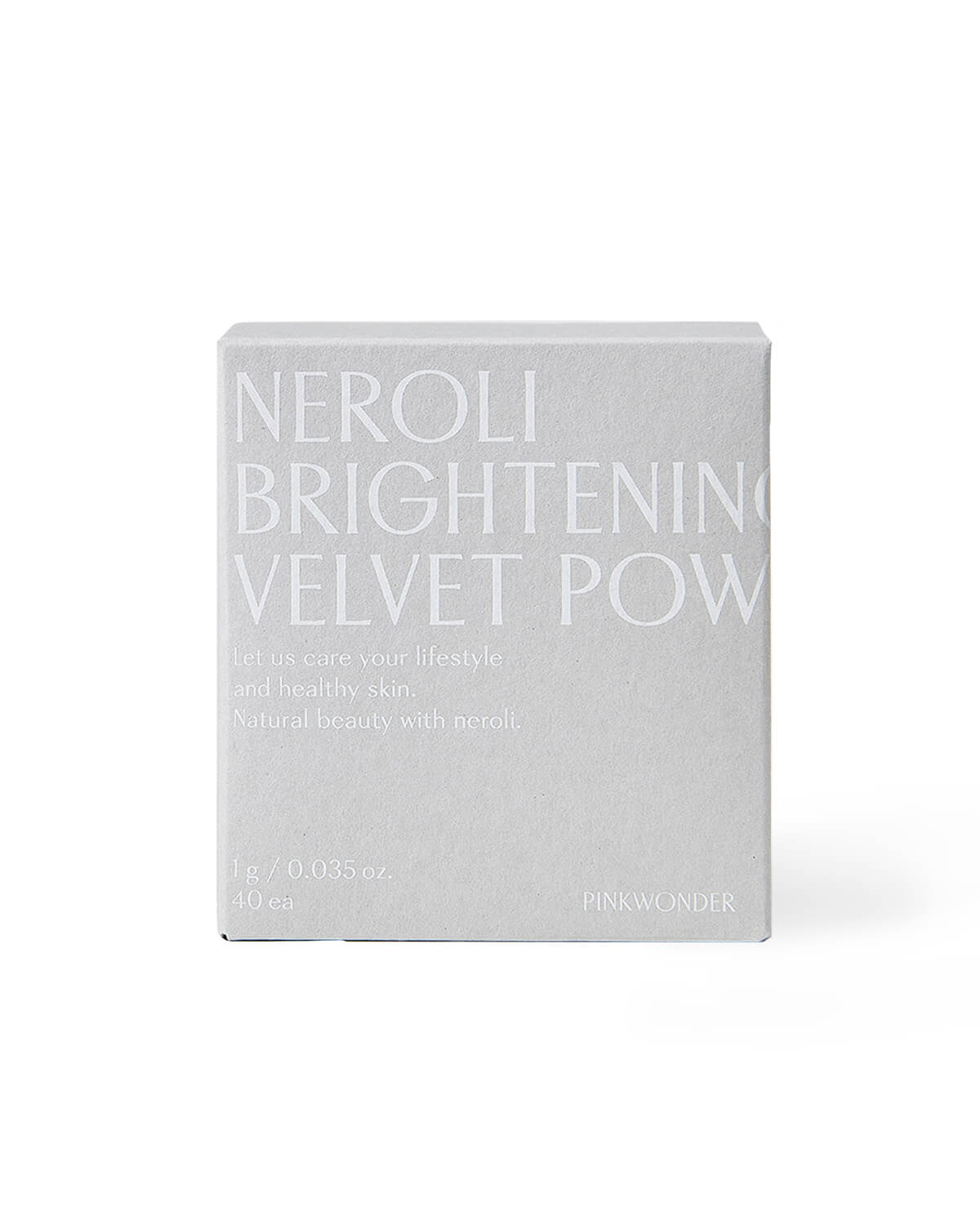 A centered product shot of the light gray cardboard box for the "Neroli Brightening Velvet Powder Wash" by Pinkwonder on a pure white background. The text is in a light gray color.