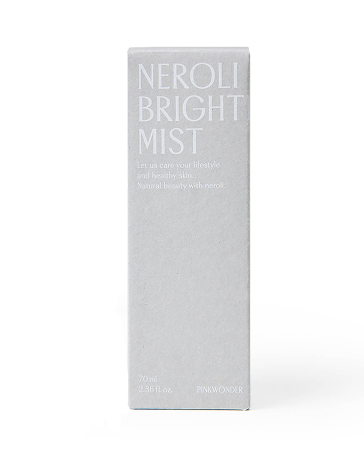 A centered product shot of the tall, light gray cardboard box for the "Neroli Brightening Mist" by Pinkwonder on a pure white background. The text is in a lighter gray color.
