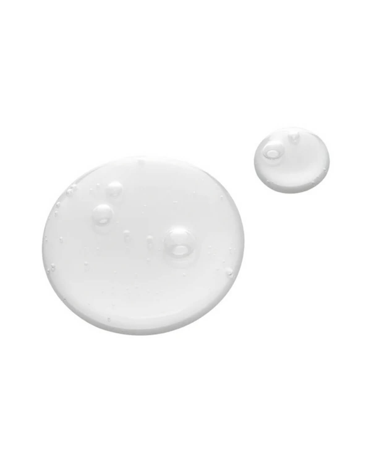 Close-up texture of clear, watery Tocobo Lemon Toner drops showing its lightweight exfoliating formula.