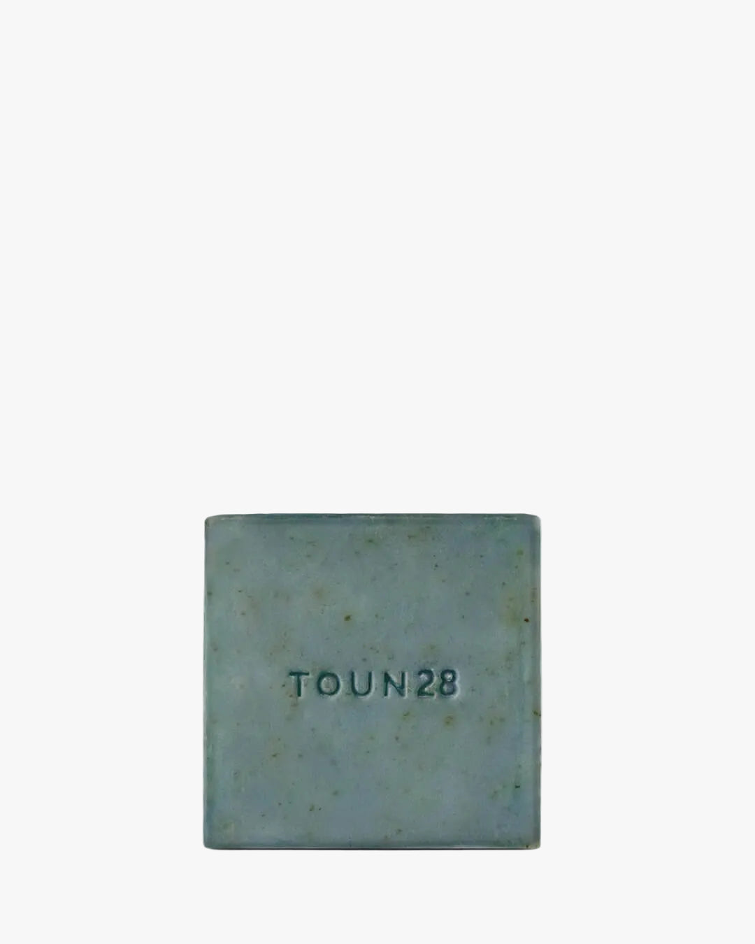 Toun28 S20 white anti-dandruff shampoo bar with sea salt and menthol on white background