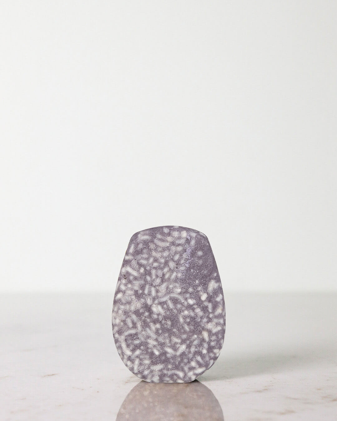 Urang Daily Oil Control Shampoo Bar, a solid, plastic-free bar that removes excess oil and balances the scalp with tea tree and peppermint.