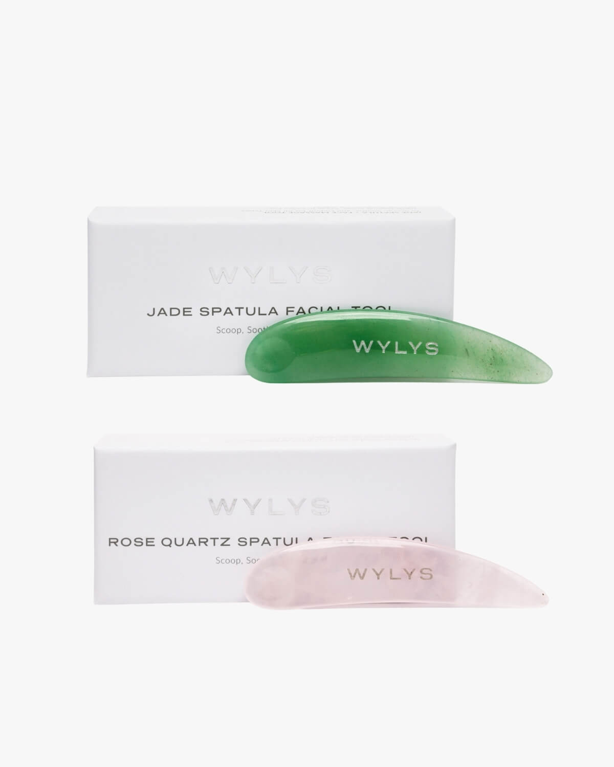 WYLYS Jade and Rose Quartz Spatula Facial Tools shown with their product boxes on a white background.