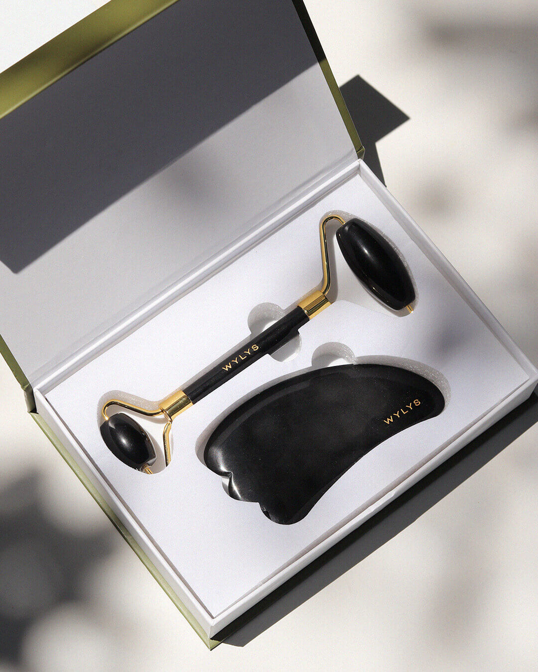 WYLYS Gua Sha Face Roller Kit Best Face Massage Tool Set to circulate, depuff, sculpt dull and puffy skin. Use with an oil. Black obsidian and gold metal. 100% natural materials.