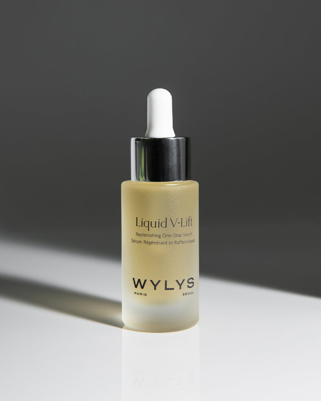 WYLYS Liquid V-Lift One-Step Serum Bottle in Hands When You Love Your Skin One-Step Replenishing Peptide serum to help lift and hydrate. Herol. Made in France.