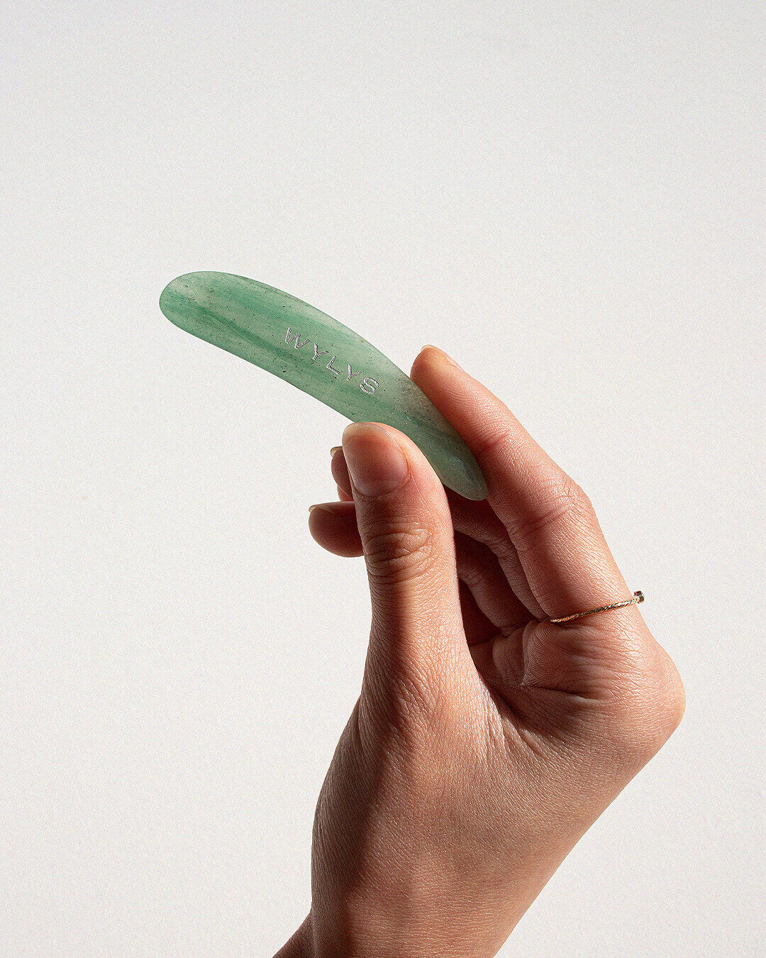Wylys Jade Spatula in Hand When You Love Your Skin Multipurpose facial tool to scoop, sculpt, and depuff, 100% natural material