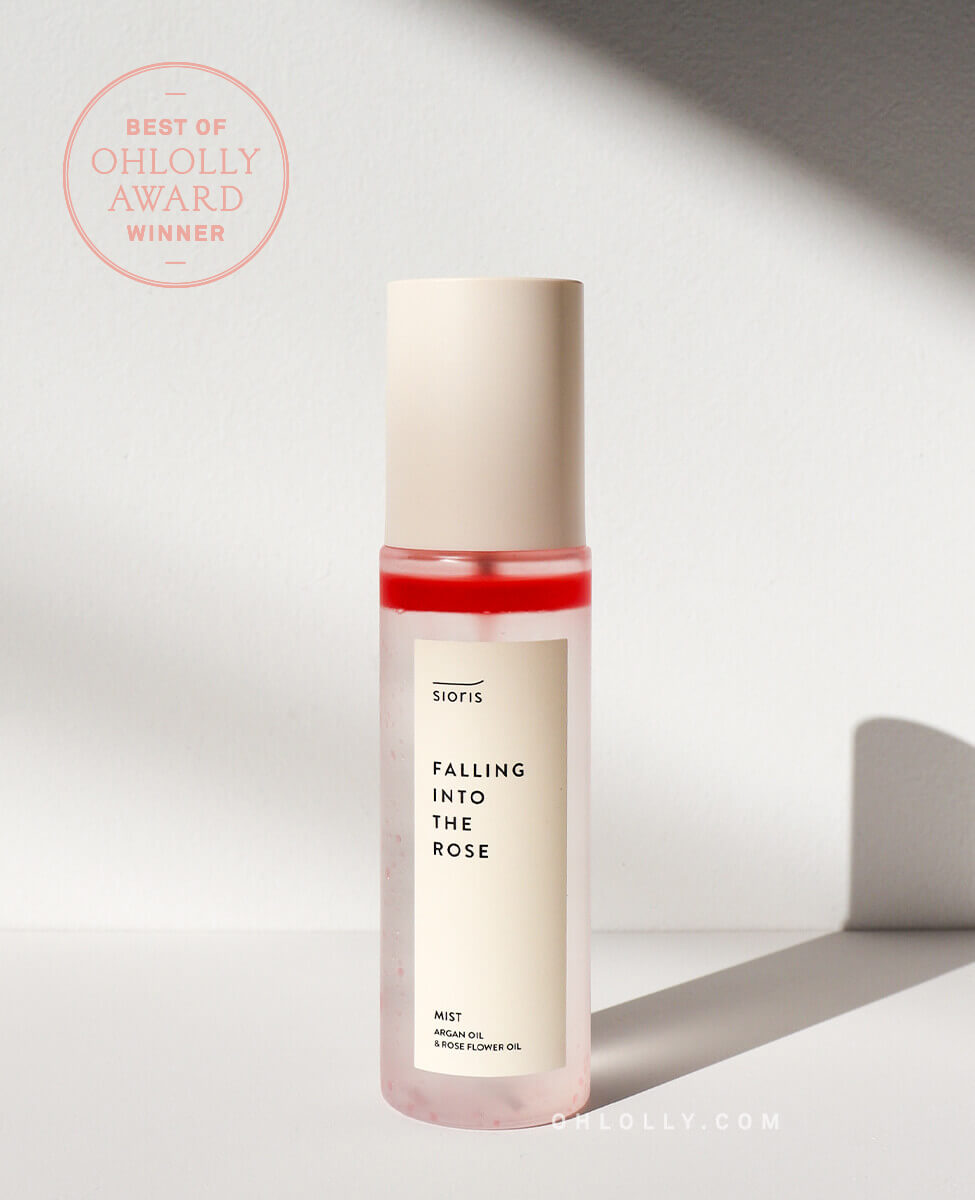 Sioris Falling Into The Rose Mist bottle with green tea and rose water on white background