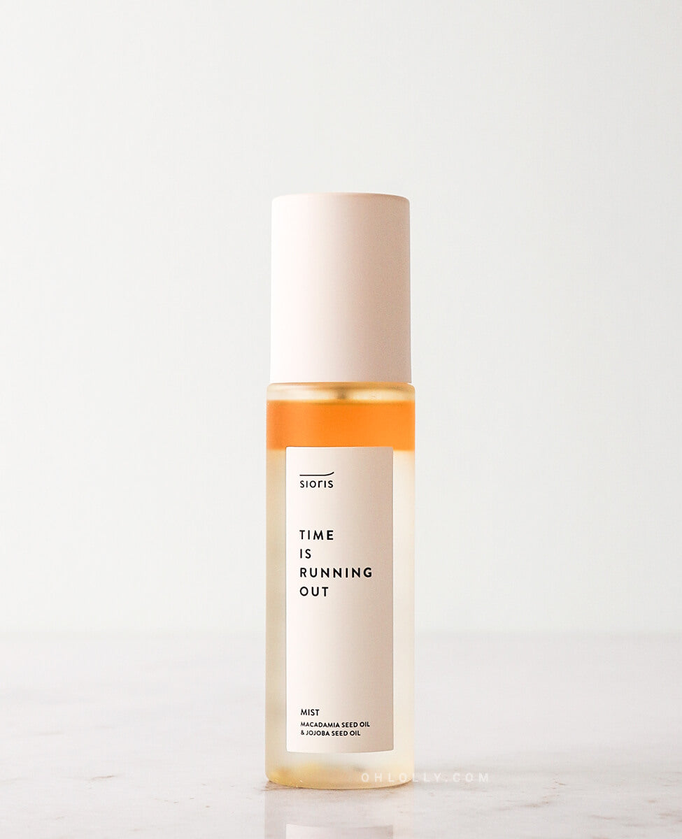 Sioris Time is Running Out Mist bottle with organic fruit water on white background