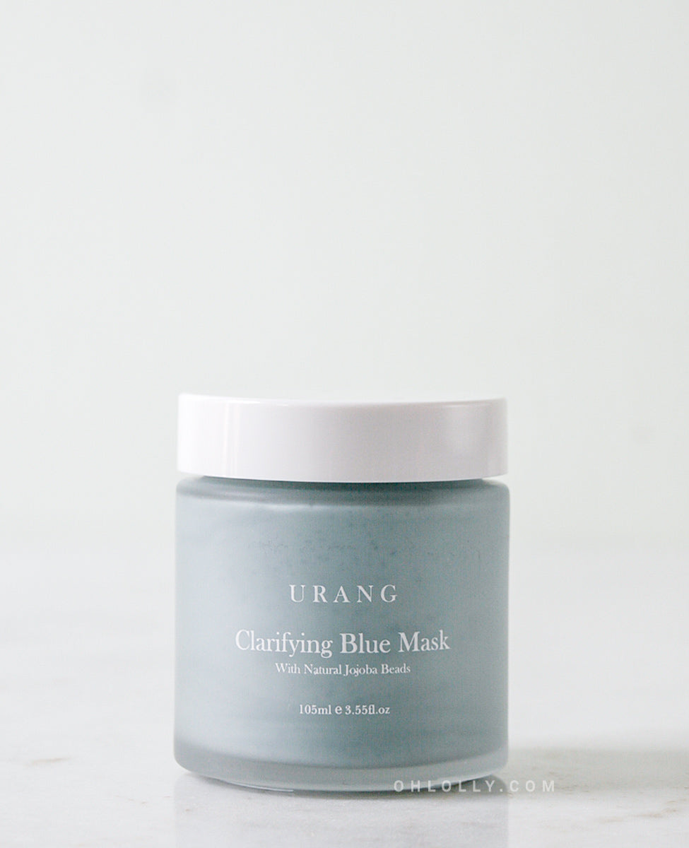Urang Clarifying Blue Mask jar with white lid on a light background, a brightening wash-off mask formulated to clarify and gently exfoliate dull skin.