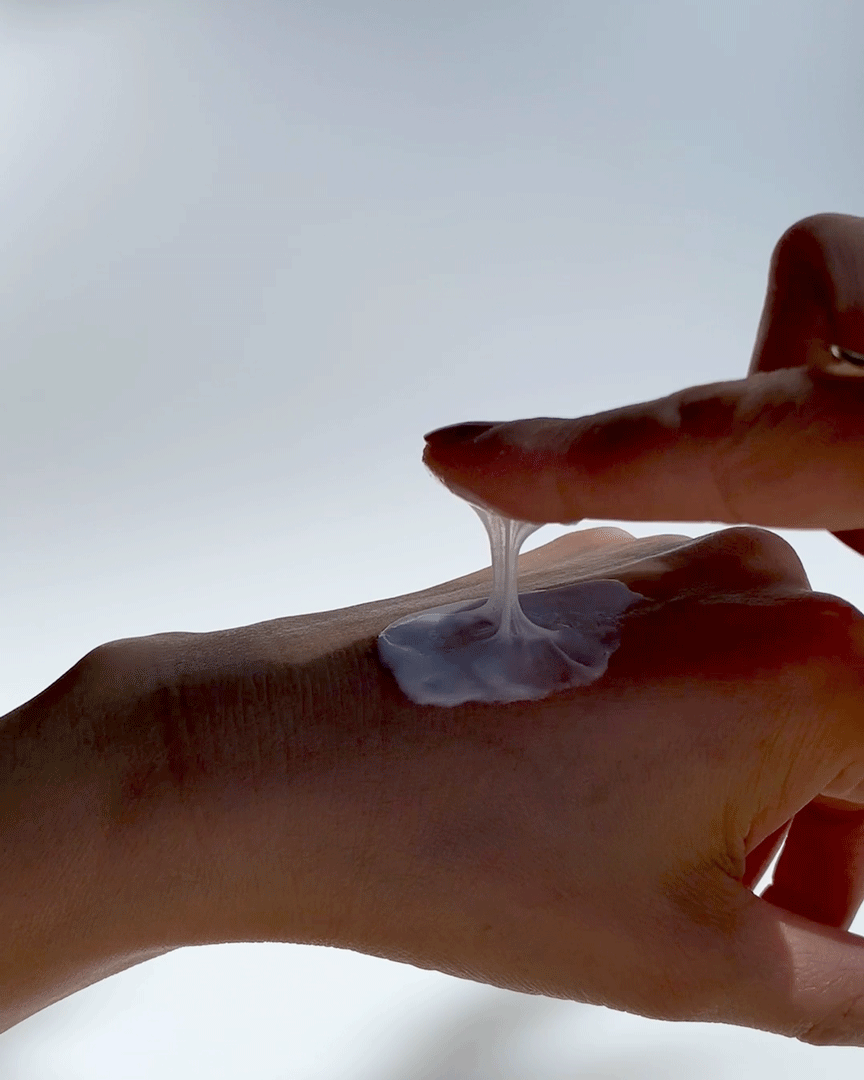 Animated close-up usage shot (GIF) of the Pyunkang Yul Cleansing Foam being dispensed onto a hand, demonstrating the product's unique, sticky, and stretchy consistency, which adheres to and removes dirt and oil from pores.