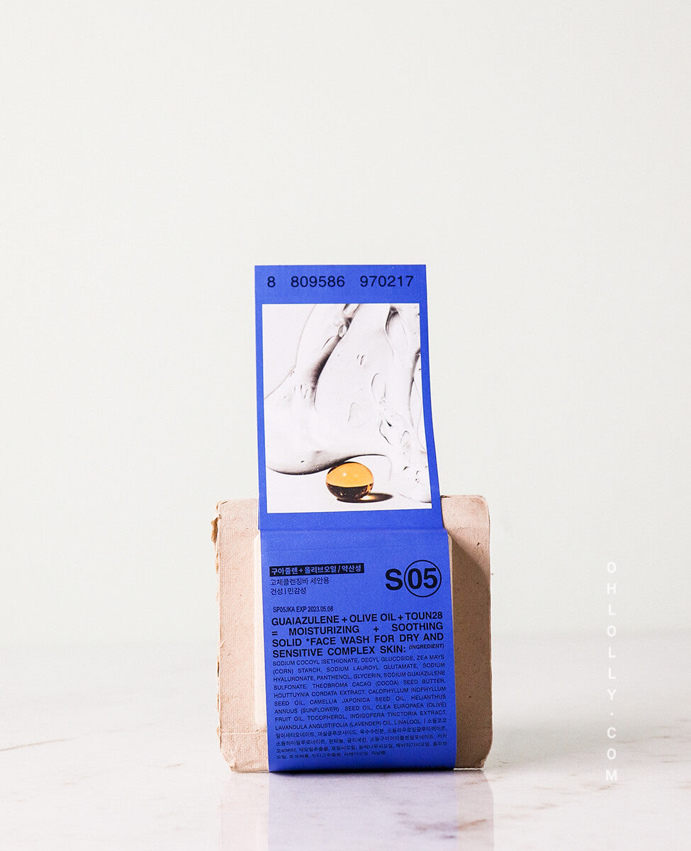 Toun28 S05 blue face bar with guaiazulene and olive oil in packaging on clean plain background