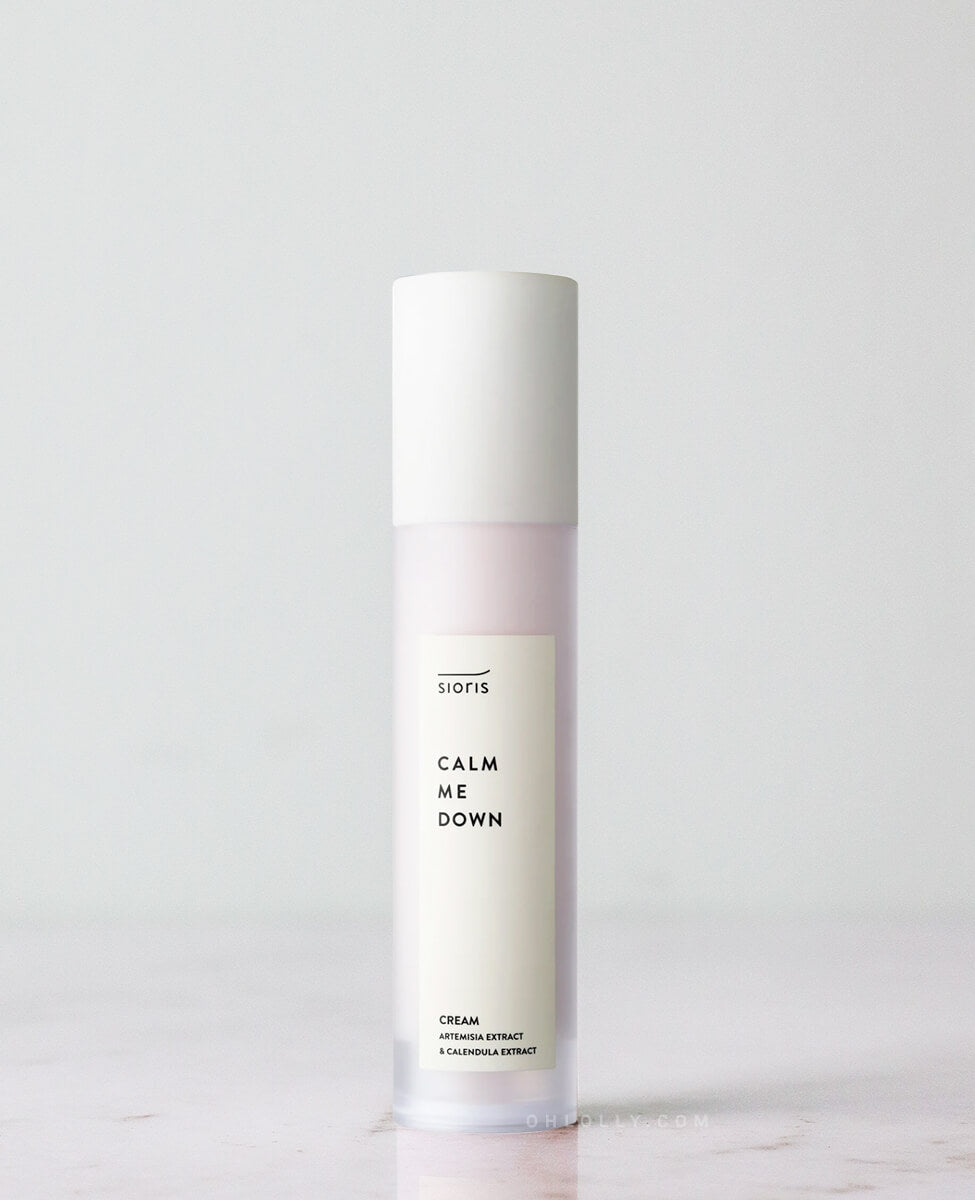 Sioris Calm Me Down Cream jar with omija fruit and calendula on white background