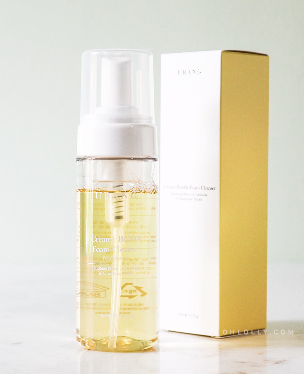 Urang Creamy Bubble Foam Cleanser pump bottle and product box, highlighting its vegan, all-natural formula that soothes sensitive skin with chamomile and calendula.