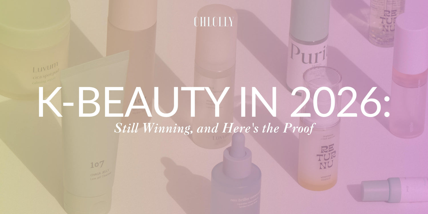 A colorful graphic with pastel gradient tones displaying various skincare products with the text "K-BEAUTY IN 2026: Still Winning, and Here's the Proof."