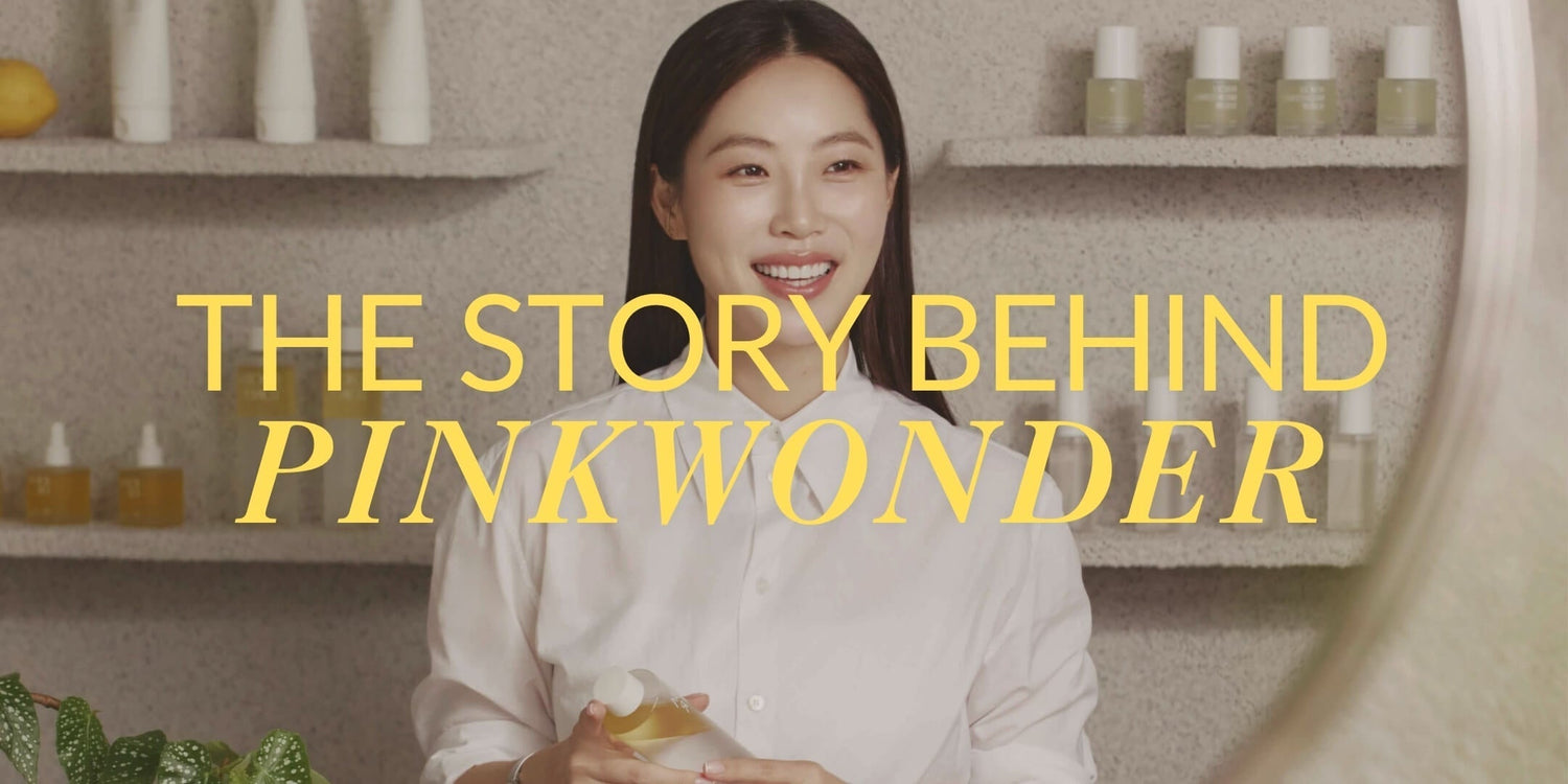 Founder smiling with products for The Story Behind Pinkwonder brand history and mission.