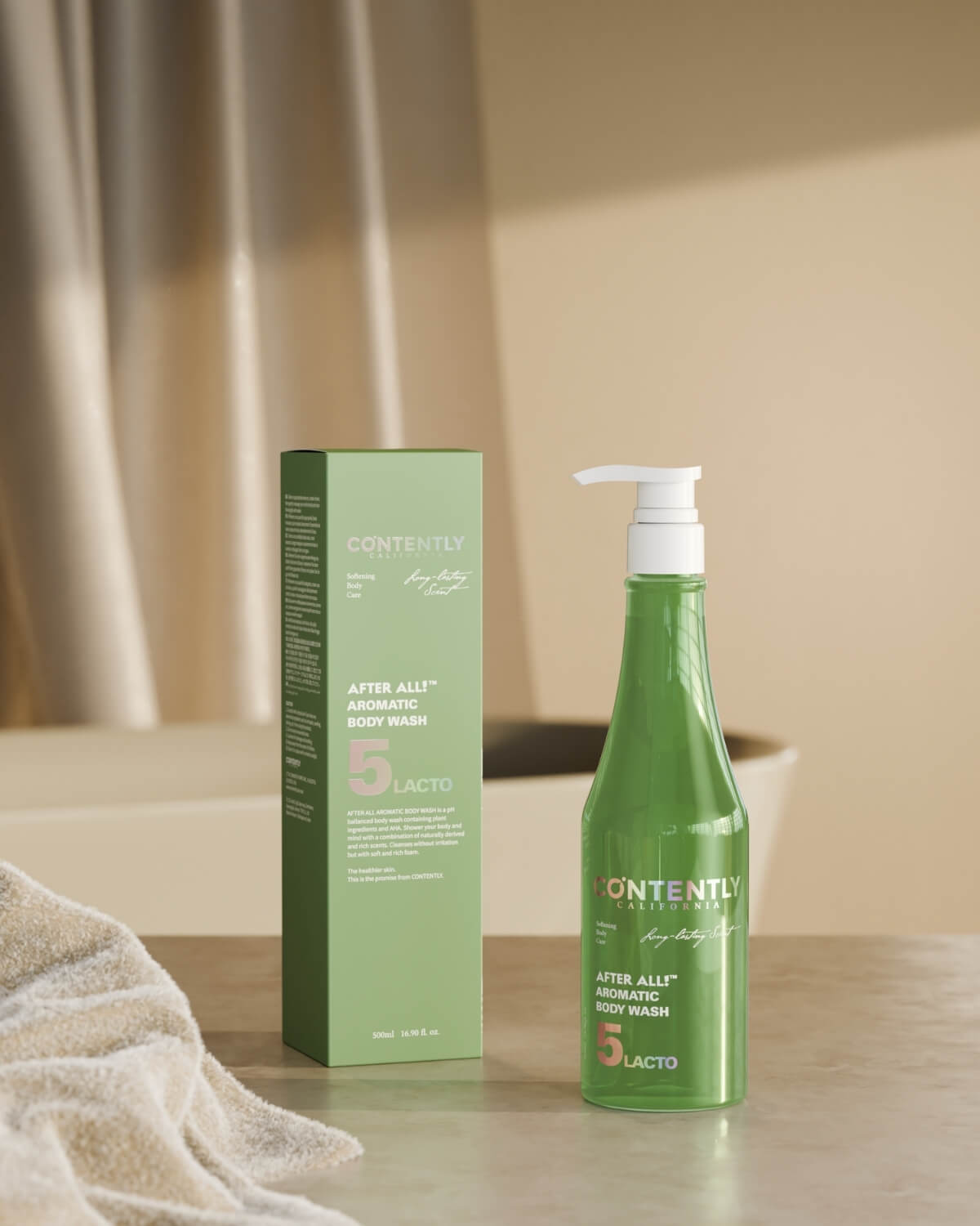 A green bottle of CONTENTLY CALIFORNIA's "After All! Aromatic Body Wash" stands next to its matching green cardboard box. A draped, light-colored towel is in the foreground, and a blurred white bathtub with a gold faucet is in the background.