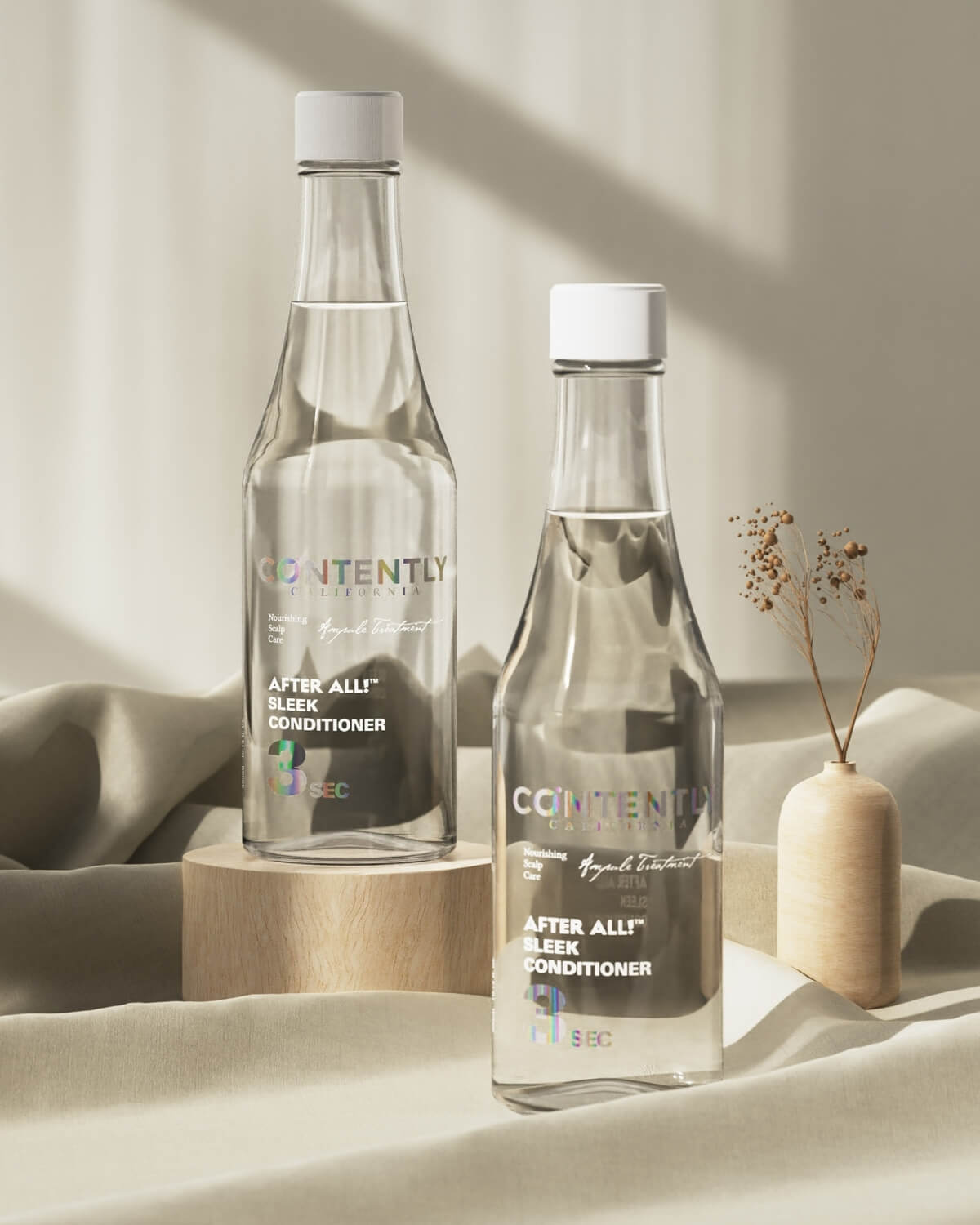 Two clear bottles of the Sleek Conditioner are displayed on wooden and white platforms against a soft, draped beige background with a small dried flower accent.