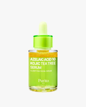 A studio shot of a closed dropper bottle of Purito Azelaic Acid 10 Kojic Tea Tree Serum on a white background. The bi-phase serum has a clear, lime green bottom layer and a concentrated golden-yellow top layer with bright specks.
