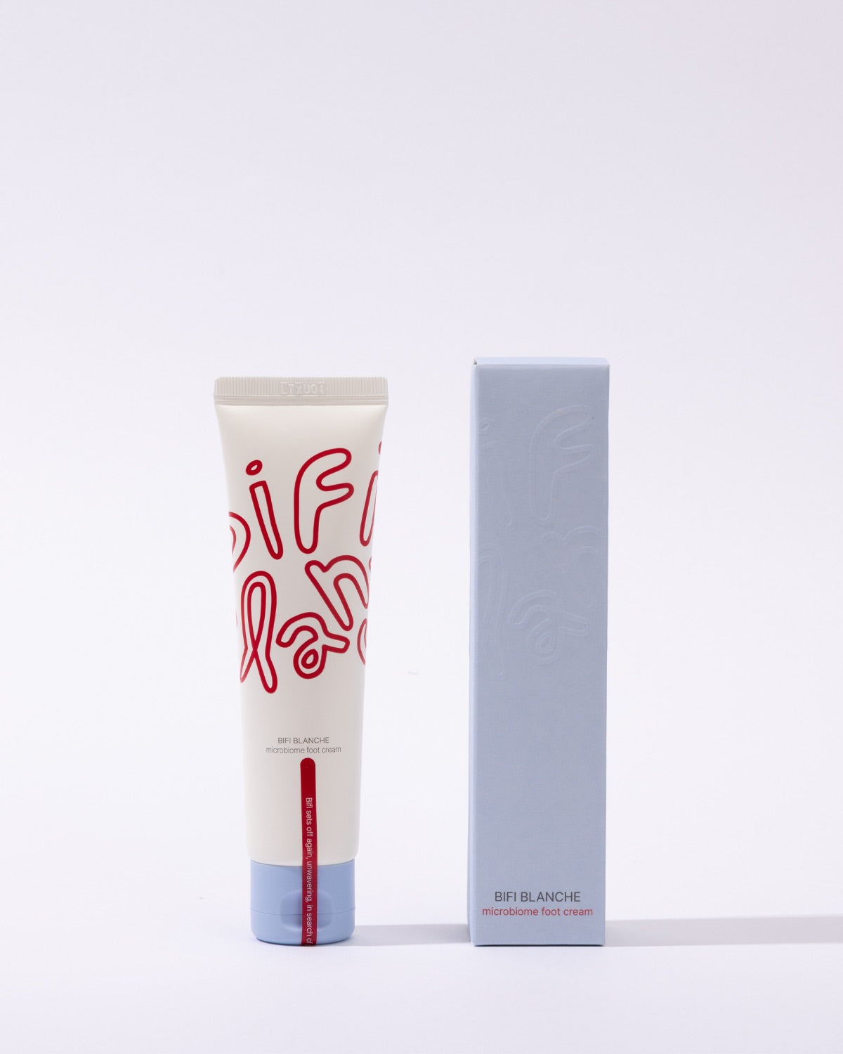 A tube of Bifi Blanche Foot Cream standing next to its blue-gray product box.