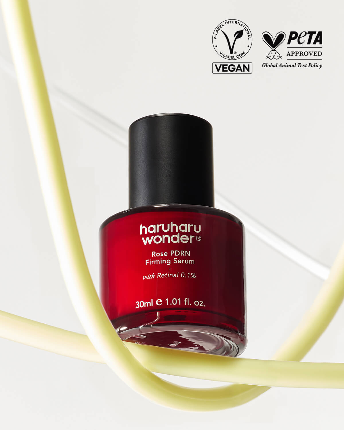 Haruharu Wonder Rose PDRN Firming Serum bottle with Vegan and PETA Approved certification labels.
