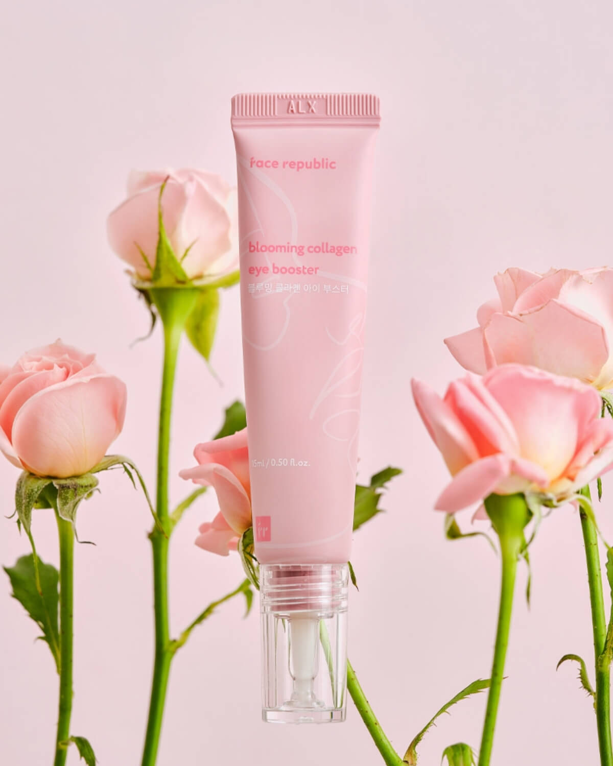 Face Republic Blooming Collagen Eye Booster product packaging styled with pink roses.