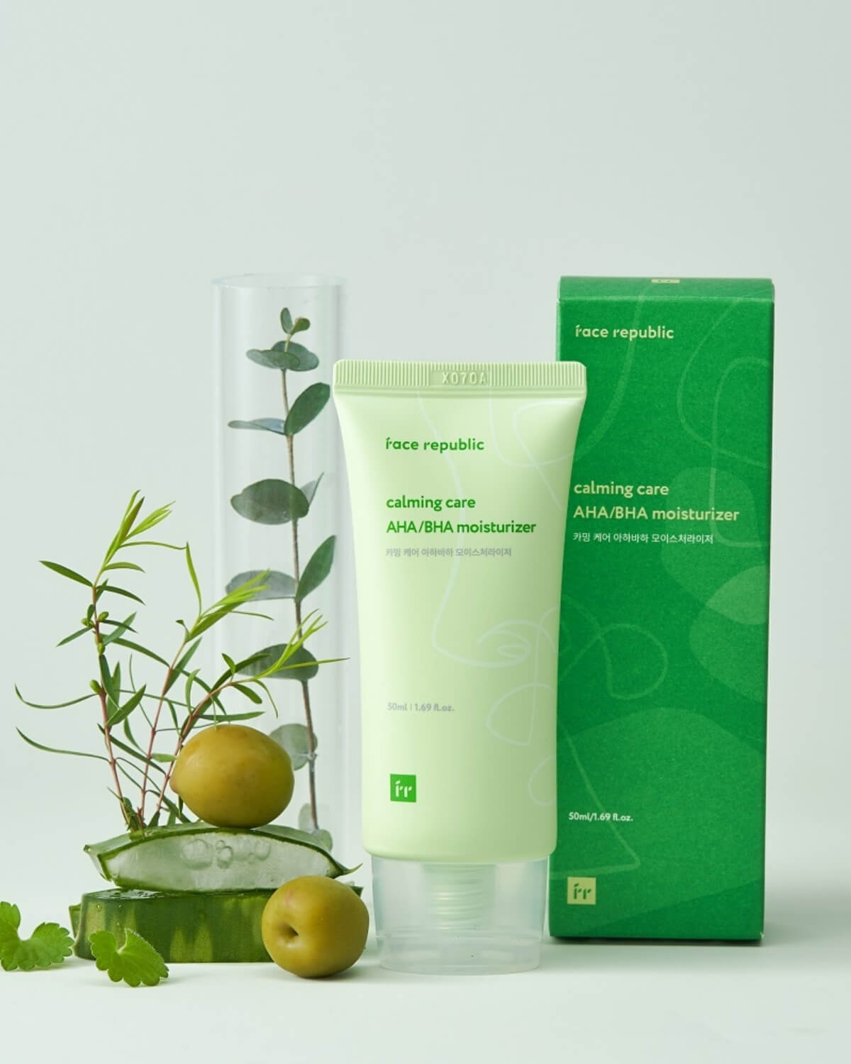 Face Republic AHA BHA moisturizer tube and green packaging box with aloe vera and olives.